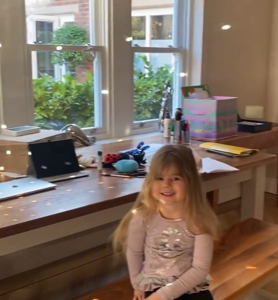Daughter Milena shares Kristina's workspace