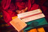 a photo of a meditating Buddhist