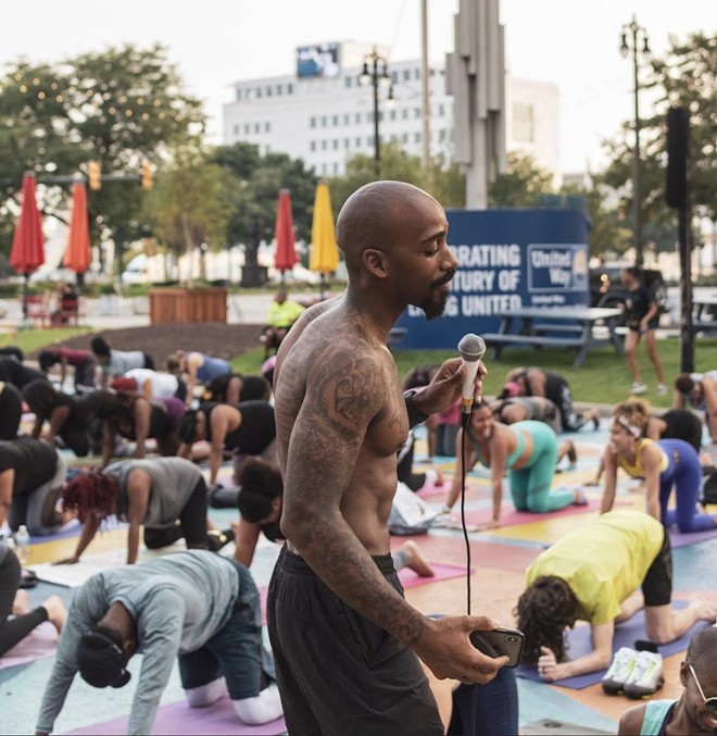 Randall hosted a “Yin Nights” series downtown at the Spirit of Detroit Plaza over the summer that saw over 100 people, most of them Black, practicing yoga.  - Courtesy photo