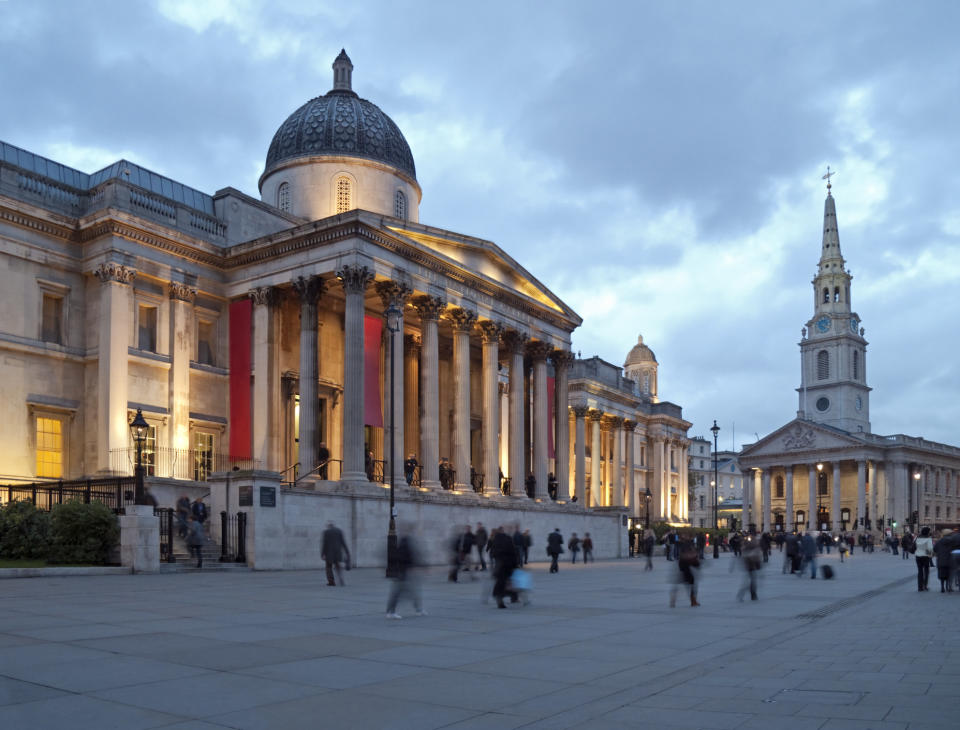 The National Gallery and the Church of St Martin-in-the-Fields in London at dusk