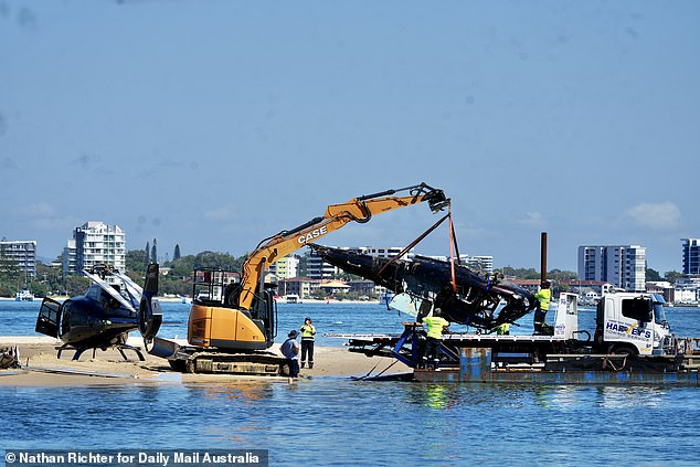 The wreckage is carefully loaded onto the back of a truck as the Australian Transport Safety Bureau revealed initial findings from their investigation on Tuesday